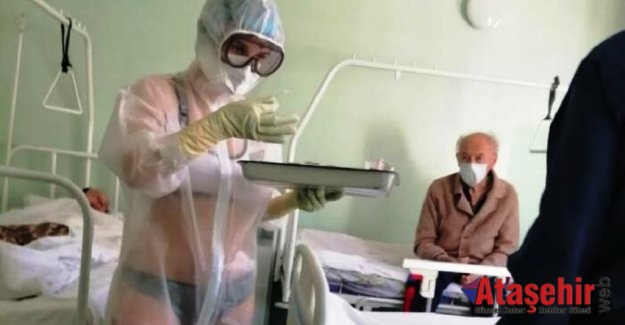 Rusya'da bir hemşire Covid-19 hastalarını bikiniyle tedavi etti